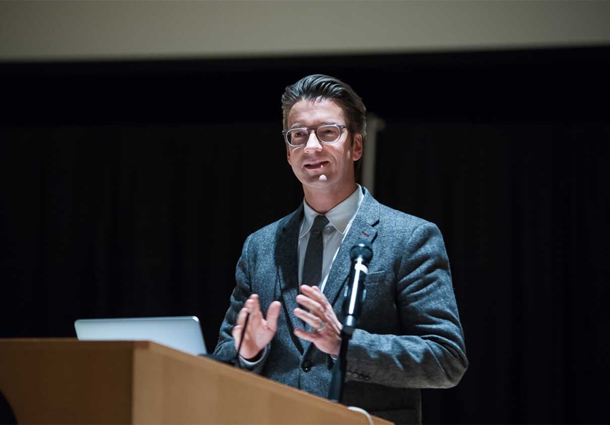 Fritz Klaetke gives a speech after becoming an AIGA Fellow in 2016