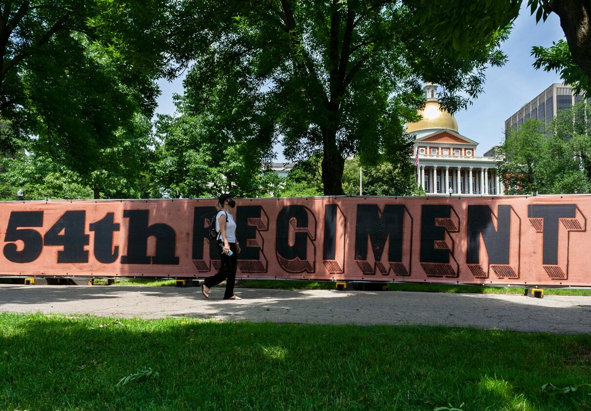 Shaw 54th on fence in front of Massachusett’s state capital